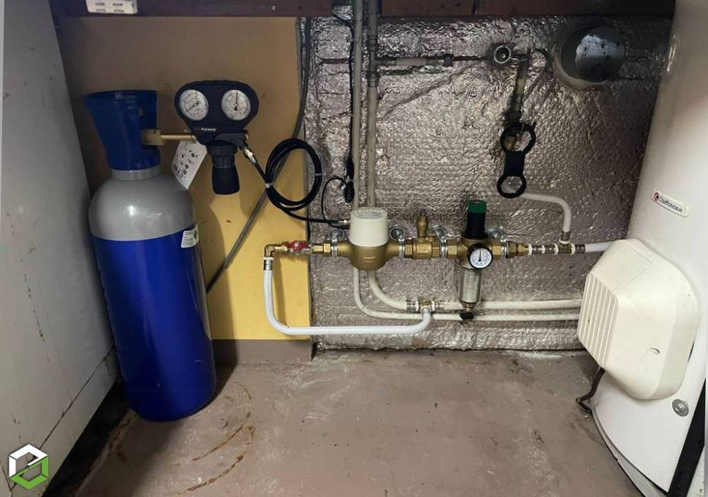 Installation d’un adoucisseur d’eau SOLUCALC à Sermérieu