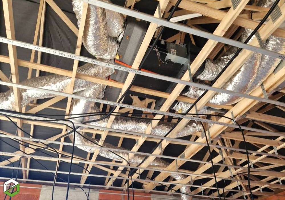 Installation d’une climatisation gainable sur maison neuve Satolas-et-Bonce